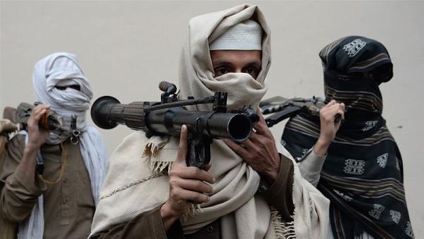 Former Afghan Taliban fighters hand over their weapons as part of a government reconciliation process in Nangarhar province. (AFP)