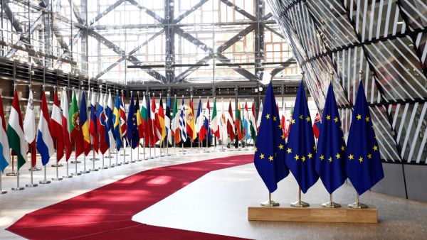 EU flags in EU Council building during the EU Summit. (Shutterstock/ File Photo)