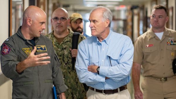 Secretary of the Navy Richard V. Spencer (center) during a visit to Naval Aviation Schools Command onboard Naval Air Station Pensacola, Florida. (Image: US Navy/ Lt. Cmdr. Juan Guerra)