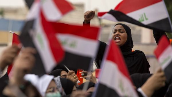 An Iraqi demonstrator chants as she takes part in an anti-government march in the center of the southern city of Basra on December 2, 2019. (AFP/ File Photo)