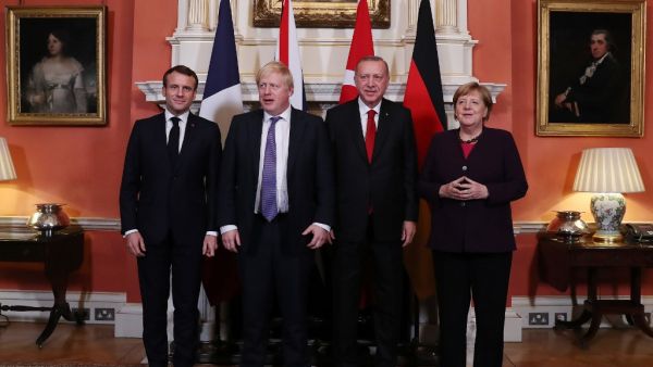 A handout picture provided by the Turkish Presidential Press Service on December 3, 2019 shows (From L) French President Emmanuel Macron, British Prime Minister Boris Johnson, Turkish President Recep Tayyip Erdogan, German Chancellor Angela Merkel during the Quartet Syria Summit in London. NATO leaders gather Tuesday for a summit to mark the alliance's 70th anniversary but with leaders feuding and name-calling over money and strategy, the mood is far from festive. Murat CETINMUHURDAR / TURKISH PRESIDENTIAL 