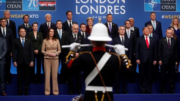 NATO leaders pose for a family photo during the NATO summit at the Grove hotel in Watford, northeast of London on December 4, 2019. CHRISTIAN HARTMANN / POOL / AFP