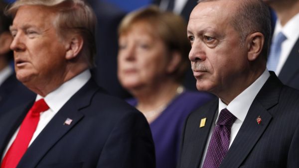 US President Donald Trump (L) and Turkey's President Recep Tayyip Erdogan (R) pose for the family photo at the NATO summit at the Grove hotel in Watford, northeast of London on December 4, 2019. PETER NICHOLLS / AFP / POOL