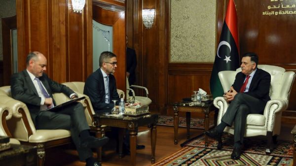 Libya's UN-recognised Prime Minister Fayez al-Sarraj (R) meets with the European Union's ambassador to Tripoli Alan Bugeja (L) and Germany's ambassador Oliver Owcza in the Libyan capital on December 5, 2019. (AFP/ File Photo)