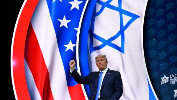 US President Donald Trump stands on stage after his address to the Israeli American Council National Summit 2019 at the Diplomat Beach Resort in Hollywood, Florida on December 7, 2019. MANDEL NGAN / AFP
