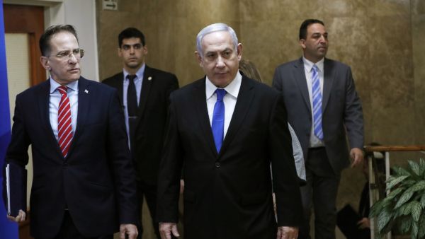 Israeli Prime Minister Benjamin Netanyahu (C) arrives at the weekly cabinet meeting in Jerusalem December 8, 2019. (AFP/ File Photo)