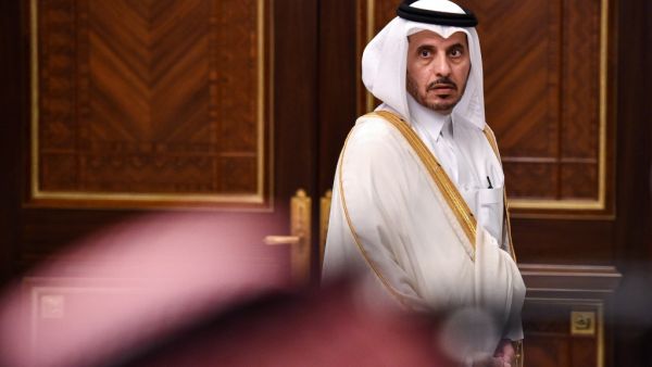 Abdullah bin Nasser bin Khalifa al-Thani, Qatar's Prime Minister, is seen waiting for a family picture during the 40th Gulf Cooperation Council (GCC) summit held at the Saudi capital Riyadh on December 10, 2019. Fayez Nureldine / AFP