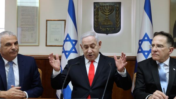 Israeli Prime Minister Benjamin Netanyahu (C) chairs the weekly cabinet meeting at his Jerusalem office on December 15, 2019. GALI TIBBON / POOL / AFP