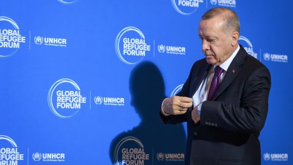 Turkey's President Recep Tayyip Erdogan arrives for the opening of the Global Refugee Forum, on December 17, 2019 in Geneva. A global refugee summit opens in Geneva amid calls for concrete actions to help a surging number of displaced people, and for wealthy nations to shoulder their share of the burden Fabrice COFFRINI / AFP