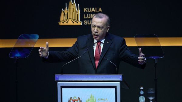 Turkey's President Recep Tayyip Erdogan delivers his speech during the opening ceremony of the Kuala Lumpur Summit in Kuala Lumpur on December 19, 2019. Mohd RASFAN / AFP