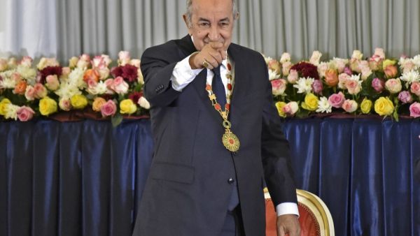 Algerian President Abdelmadjid Tebboune points at the audience during the formal swearing-in ceremony in the capital Algiers  (AFP)