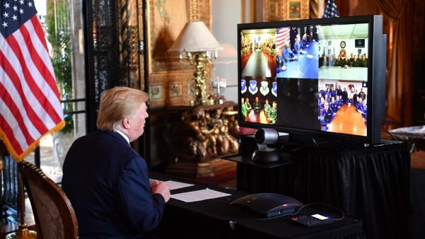 US President Donald Trump makes a video call to the troops stationed worldwide at the Mar-a-Lago estate in Palm Beach Florida, on December 24, 2019. Nicholas Kamm / AFP