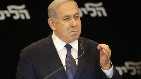 Israeli Prime Minister Benjamin Netanyahu speaks at a press conference regarding his intention to file a request to the Knesset for immunity from prosecution, in Jerusalem on January 1, 2020. GIL COHEN-MAGEN / AFP