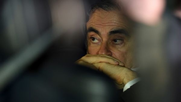 This file photo taken on March 6, 2019 shows former Nissan chairman Carlos Ghosn leaving his lawyers' offices after he was released earlier in the day from a detention centre after posting bail in Tokyo. Carlos Ghosn's escape from Japan is "unjustifiable" and he is thought to have left the country using "illegal methods", the Japanese justice minister said on January 5, 2020, in the first official public comments on the case. Kazuhiro NOGI / AFP