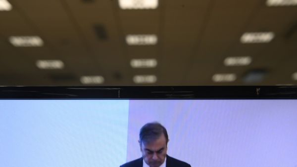 An image taken on a screen in Paris shows former Nissan chief Carlos Ghosn holding a press conference in Beirut on January 8, 2020, the first by the fugitive car magnate since his escape from trial in Japan. Olivier MORIN / AFP