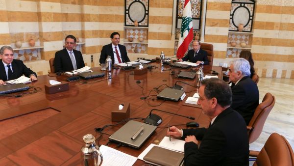 Lebanese President Michel Aoun (C) heads the first meeting of Prime Minister Hassan Diab's (3rd-L) newly constituted government at the presidential palace in Baabda east of capital Beirut on January 22, 2020. (AFP/ File Photo)