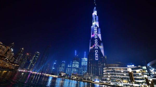 Dubai's Burj Khalifa, world's tallest building, is illuminated during festivities marking countdown to Expo 2020 (AFP)