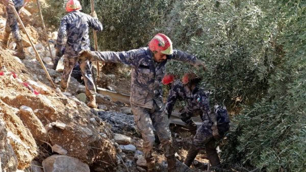 Jordanian rescue teams search for missing persons following flash floods in the city of Madaba on November 10, 2018. AFP