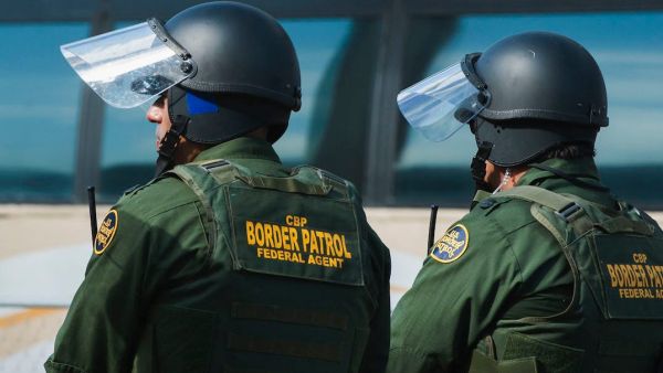 US Customs and Border Protection agents participate in a training exercise at a vehicle entry point along the border with Mexico on November 5, 2018, in Hidalgo, Texas. ( Andrew Cullen/AFP/Getty Images)