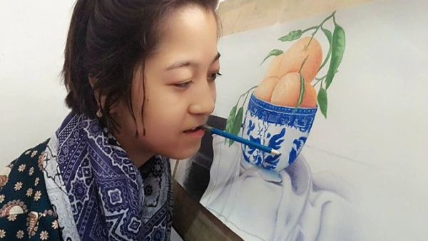 Rubaba Muhammadi, 20, who has painted a total of 250 pictures since her childhood without taking any formal education. (Twitter)