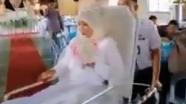 Couple arrives in ambulance for wedding (Facebook)