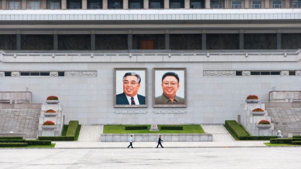 City Square with The Grand People's Study House with portraits of korean leaders Kim Il Sung and Kim Jong Il (Shutterstock)	