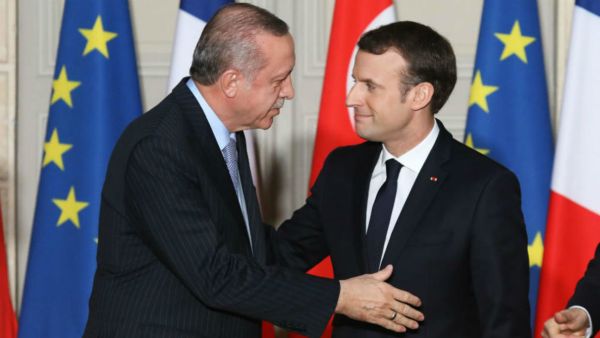 French President Emmanuel Macron with Turkish President Erdogan. (AFP)