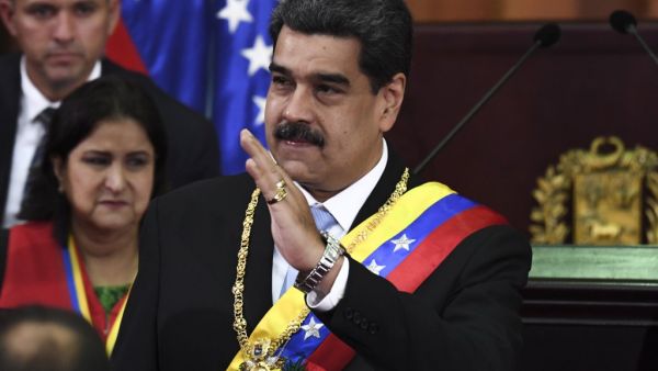 Venezuelan President Nicolas Maduro waves during the opening ceremony of the judicial year at the Supreme Court of Justice in Caracas, on January 31, 2020. Yuri CORTEZ / AFP