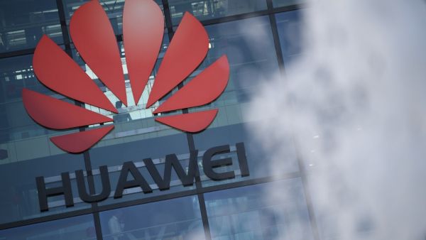 In this file photo taken on January 28, 2020 A photograph shows the logo of Chinese company Huawei at their main UK offices in Reading, west of London, on January 28, 2020. British telecoms giant Vodafone said on February 5, 2020 that it would cost 200 million euros ($221 million) over five years to remove Chinese group Huawei's equipment from core 5G European activities. DANIEL LEAL-OLIVAS / AFP