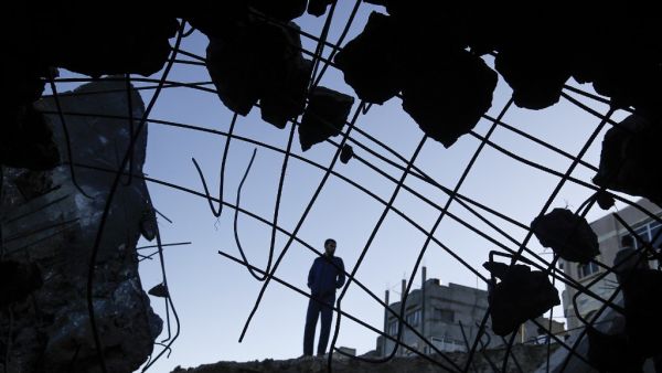 A Palestinian man inspects the site of an Israeli airstrike at Al-Shatee refugee camp in Gaza City February 6, 2020. Israeli aircraft struck Hamas positions in Gaza early Thursday, the military said, after Palestinians in the enclave again launched projectiles and explosive balloons at the Jewish state MOHAMMED ABED / AFP