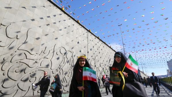 Iranians attend commemorations marking 41 years since the Islamic Revolution in the capital Tehran's Azadi Square on February 11, 2020. Thousands of Iranians massed for commemorations marking 41 years since the Islamic Revolution, in a show of unity at a time of heightened tensions with the United States. The celebrations mark the day that Shiite cleric Khomeini returned from exile and ousted the shah's last government. ATTA KENARE / AFP