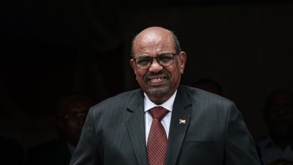 this file photo taken on July 05, 2018 Sudan's President Omar al-Bashir walks to make his speech during the inauguration ceremony of Djibouti International Free Trade Zone (DIFTZ) in Djibouti. Yasuyoshi CHIBA / AFP