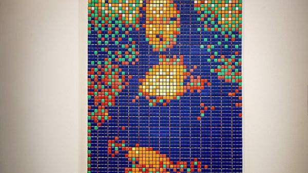 The street art Rubik's Cube version of the 'Mona Lisa' entitled 'Rubik Mona Lisa' made in 2005 by French artist Invader on display at the Artcurial auction house in Paris. The artwork was sold for 480,000 euros (£403,000) on Sunday evening (dailymail)