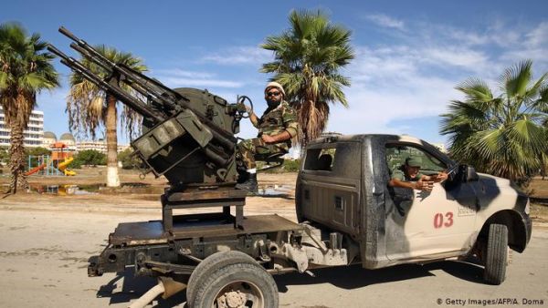 Libyan National Army forces stand guard in Benghazi. (AFP)