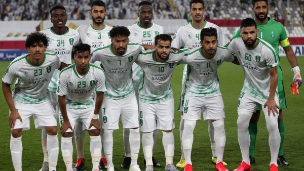 Ahli's starting eleven pose for a group picture ahead of the AFC Champions League group A match against al-Wahda FC at al-Nahyan Stadium in Abu Dhabi on February 10, 2020.