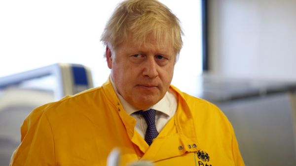 Britain's Prime Minister Boris Johnson visits a laboratory at the Public Health England National Infection Service in Colindale in north London on March 1, 2020. HENRY NICHOLLS / POOL / AFP