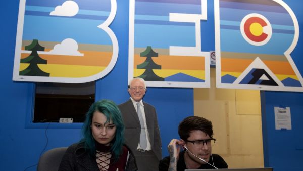 Phone bank volunteers call potential voters from the Colorado campaign office of Democratic presidential candidate Vermont Senator Bernie Sanders on Super Tuesday, March 3, 2020 in Denver, Colorado. Fourteen states and American Samoa are holding presidential primary elections, with over 1400 delegates at stake. Americans vote Tuesday in primaries that play a major role in who will challenge Donald Trump for the presidency, a day after key endorsements dramatically boosted Joe Biden's hopes against surging l