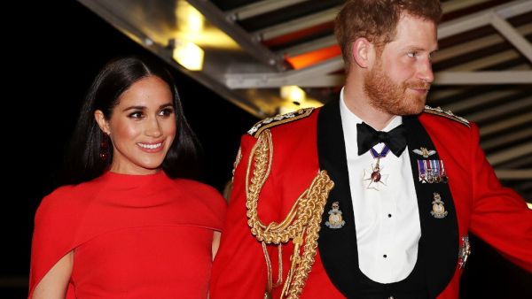 Britain's Prince Harry, Duke of Sussex and Meghan, Duchess of Sussex arrive to attend The Mountbatten Festival of Music at the Royal Albert Hall in London on March 7, 2020. The Festival brings together world-class musicians, composers and conductors of the Massed Bands of Her Majesty’s Royal Marines. This year, the performance will mark the 75th anniversary of the end of the Second World War and the 80th anniversary of the formation of Britain’s Commandos. SIMON DAWSON / POOL / AFP