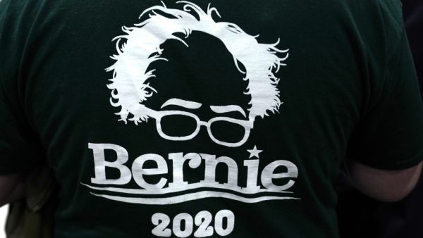 Supporters show up on election day to support Senator Bernie Sanders in Burlington, Vermont March 3, 2020. When self-styled "democratic socialist" Bernie Sanders took his first political steps as mayor of Burlington, the small Vermont town would serve as a testing ground for his progressive agenda. In Burlington, he learned about "grassroots development," one of Sanders' main assets, according to state senator Virginia Lyons, who often worked with him. TIMOTHY A. CLARY / AFP