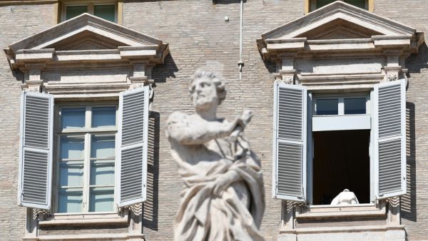 Pope Francis leaves from his window after the live-broadcast of his Sunday Angelus prayer at the Vatican on March 8, 2020, after millions of people were placed under forced quarantine in northern Italy as the government approved drastic measures in an attempt to halt the spread of the COVID-19 outbreak, caused by the novel coronavirus that is sweeping the globe. On top of the forced quarantine of 15 million people in vast areas of northern Italy until April 3, the government has also closed schools, nightcl