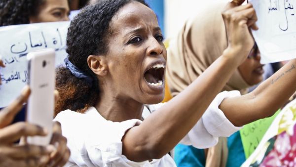 Women chant slogans during a demonstration calling for the repeal of family law in Sudan, on the occasion of International Women's Day, outside the Justice Ministry headquarters in the capital Khartoum on March 8, 2020. Under ousted president Omar al-Bashir's Islamist regime, a notorious "public order" law was used to have women publicly flogged or imprisoned for "indecent" dress or for drinking alcohol, seen as "indecent and immoral acts". Sudan's new government last November revoked the legislation -- but