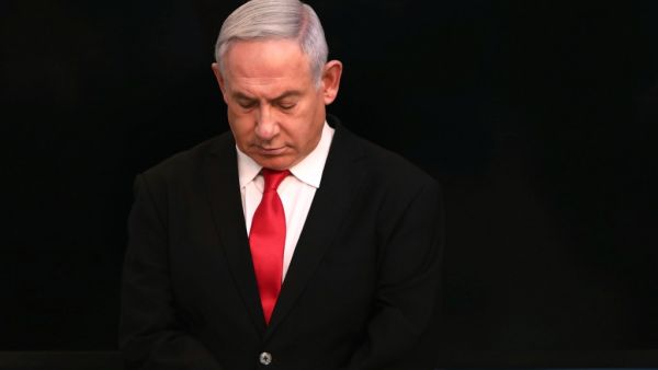 Israeli Prime Minister Benjamin Netanyahu arrives for a speech at his Jerusalem office on March 14, 2020, regarding the new measures that will be taken to fight the Corona virus in Israel. Netanyahu said Israel would shut down eateries, shopping centres and gyms in a bid to halt the spread of coronavirus. Netanyahu also said he would ask the government's approval in the upcoming cabinet meeting set to be held via video conference to allow "technologies used in the war against terror" to be used to track the