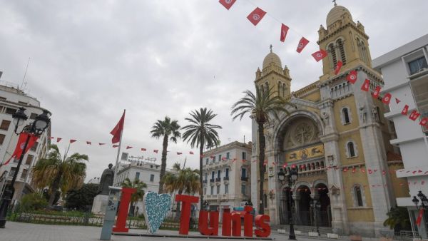 A picture taken on March 18, 2020 shows Habib Bourguiba Avenue empty shortly before a night curfew imposed to halt the spread of coronavirus, in the Tunisian capital Tunis. Tunisia has reported 24 coronavirus cases and while no deaths have been reported in the country, the virus has killed more than 6,000 worldwide. FETHI BELAID / AFP