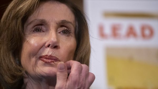 U.S. Speaker of the House Nancy Pelosi (D-CA) stands in front of a poster documenting lead in schools during an announcement to media on the Rebuild America's Schools Act on March 3, 2020 in Washington, DC. The act makes a $100 billion investment to both help repair and improve the physical and digital infrastructure of public schools. Mark Makela/Getty Images/AFP Mark Makela / GETTY IMAGES NORTH AMERICA / AFP U.S. Speaker of the House Nancy Pelosi (D-CA) stands in front of a poster documenting lead in schools during an announcement to media on the Rebuild America's Schools Act on March 3, 2020 in Washington, DC. The act makes a $100 billion investment to both help repair and improve the physical and digital infrastructure of public schools. Mark Makela/Getty Images/AFP Mark Makela / GETTY IMAGES NORTH AMERICA / AFP
