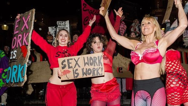 Exotic dancers perform in Piccadilly Circus in central London during a demonstration against discrimination of sex workers held on International Women's Day (DailyMail/W.Szymanowicz)