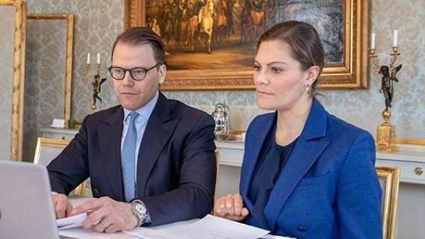 SWEDEN: Crown Princess Victoria of Sweden and her husband Prince Daniel yesterday shared this photo of them speaking to a number of agencies in order to better understand the national coronavirus situation. The photo was taken at Haga Palace, in Stockholm, where they live. (Instagram)