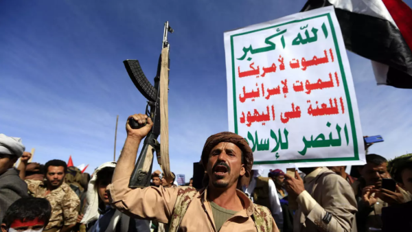 Supporters of Yemen's Houthi rebels attend a rally marking the fourth anniversary of the Saudi-led coalition's intervention in Yemen, in the capital Sanaa on March 26, 2019. Mohammerd Huwais / AFP