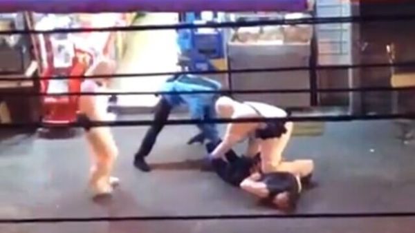 Video footage appears to show police officers in protective gear arresting an individual who allegedly violated a quarantine order in Tel Aviv, March 14, 2020 (Screen grab/Twitter)