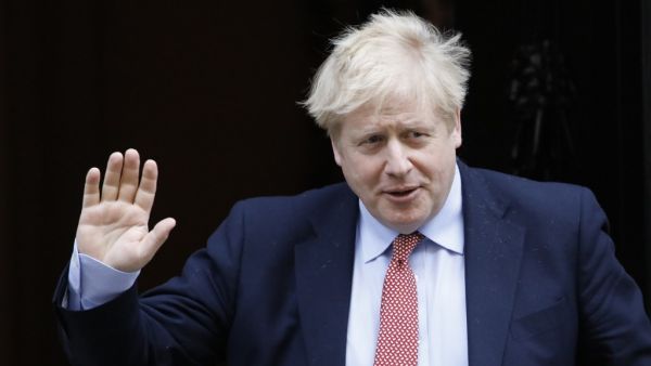 In this file photo taken on March 25, 2020 Britain's Prime Minister Boris Johnson leaves number 10 Downing Street in central London on March 18, 2020, on his way to the House of Commons to attend Prime Minister's Questions (PMQs) British Prime Minister Boris Johnson was taken to hospital on April 5, 2020 for tests, his office said, 10 days after he tested positive for coronavirus. Johnson, 55, announced he had mild symptoms of COVID-19 on March 27 and had been in self-isolation at his Downing Street residen