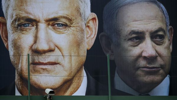 Israeli Prime Minister Benjamin Netanyahu and his former rival, parliament speaker Benny Gantz, agreed to form an emergency unity government on April 20, 2020, ending the worst political crisis in the country's history. JACK GUEZ / AFP
